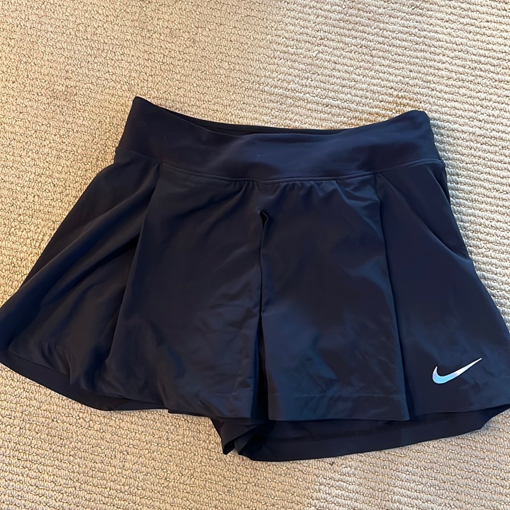 Black Nike tennis skort, never worn, size small.